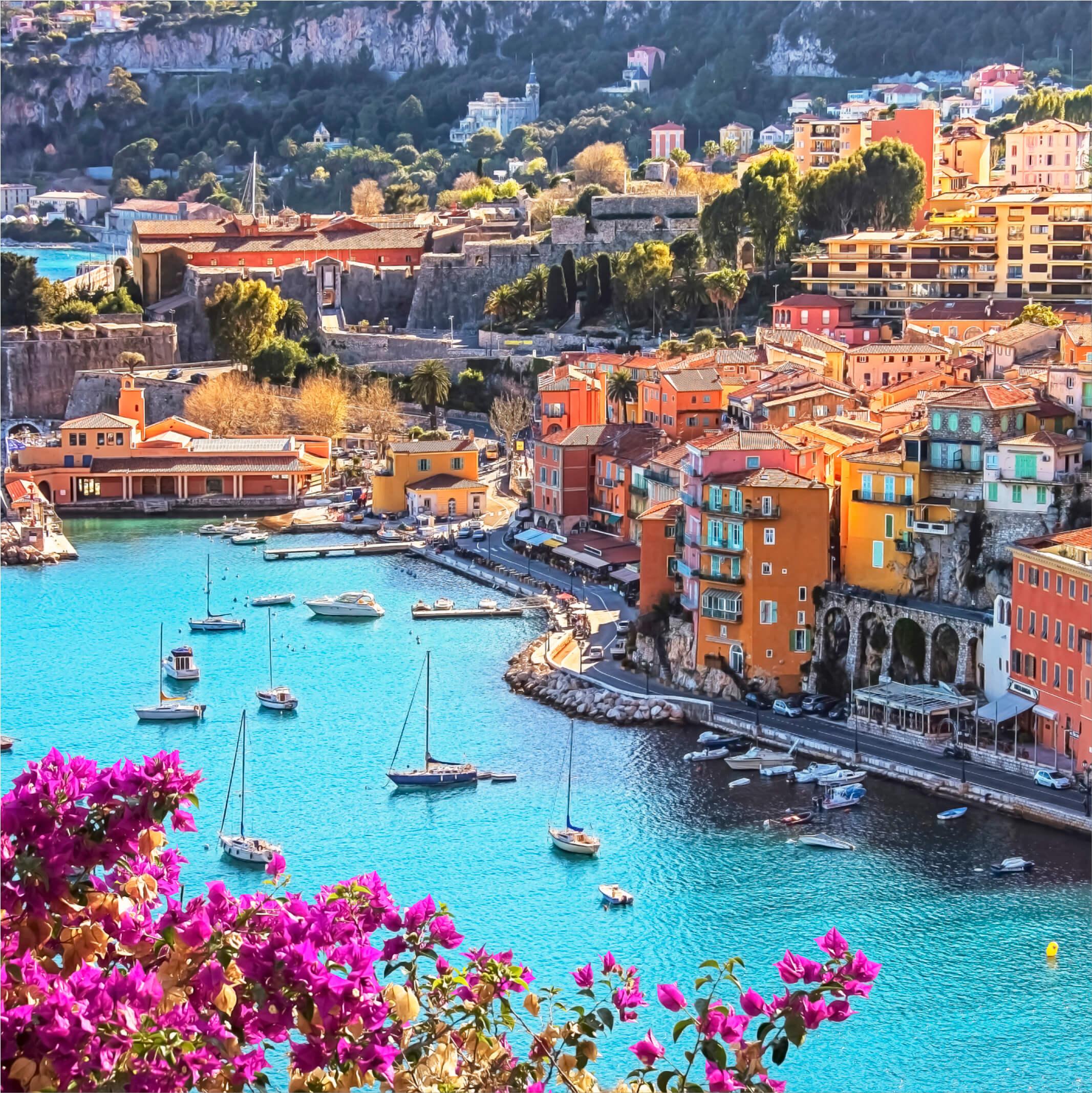 Scenic view of the French Riviera with boats scattered on the turquoise waterway