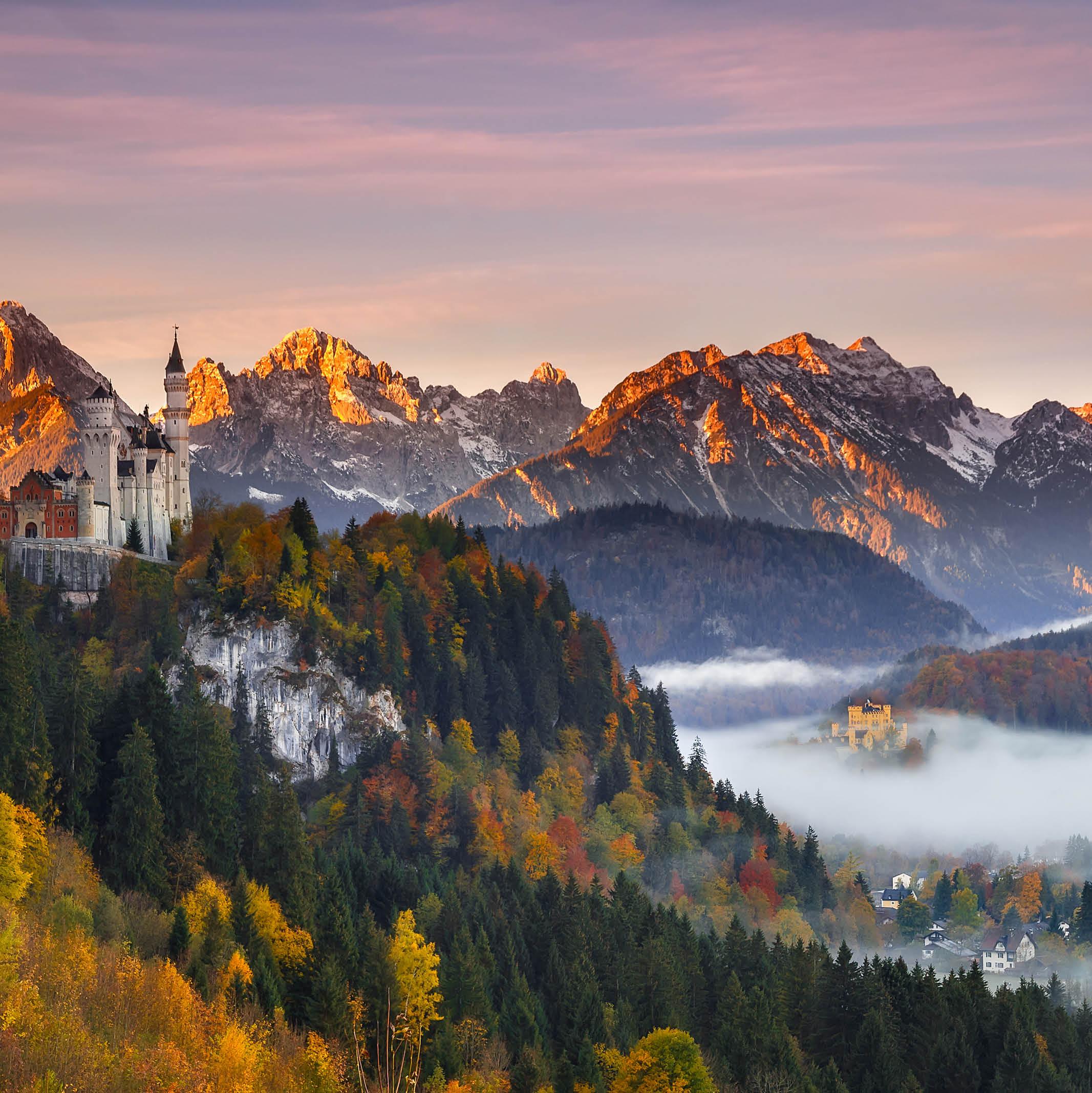 View of the Bavarian Alps with Neuschwanstein Castle in the distance