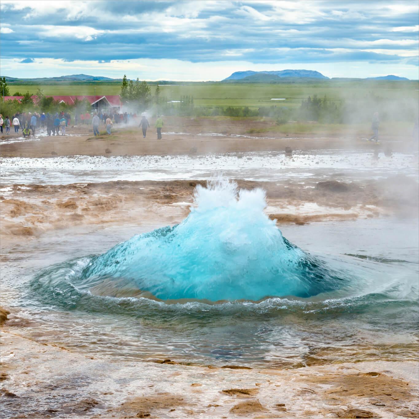 Strokkur Geyser looking turquoise as it erupts