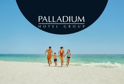 Family enjoying beach vacation at Palladium Hotel Group resort.