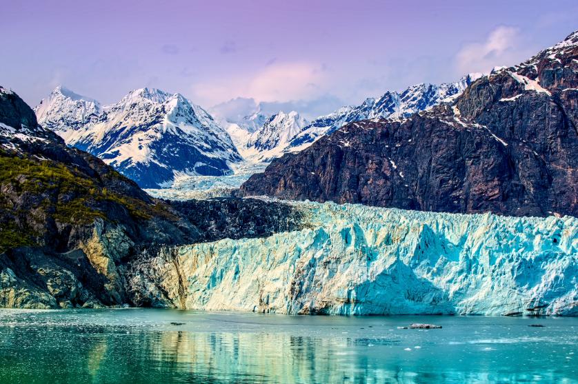 Tidewater glacier and mountain scenery on an Alaska cruise itinerary