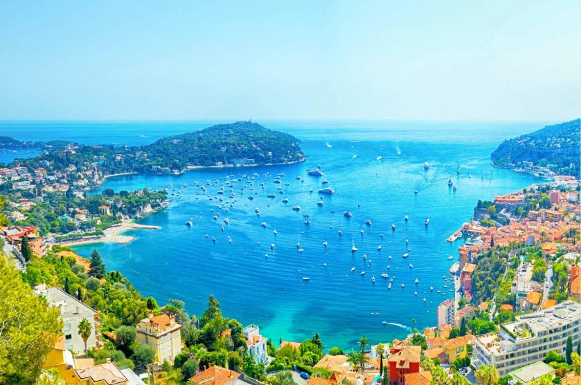 Mediterranean coastal harbor viewed from above on a Captain’s Choice journey.