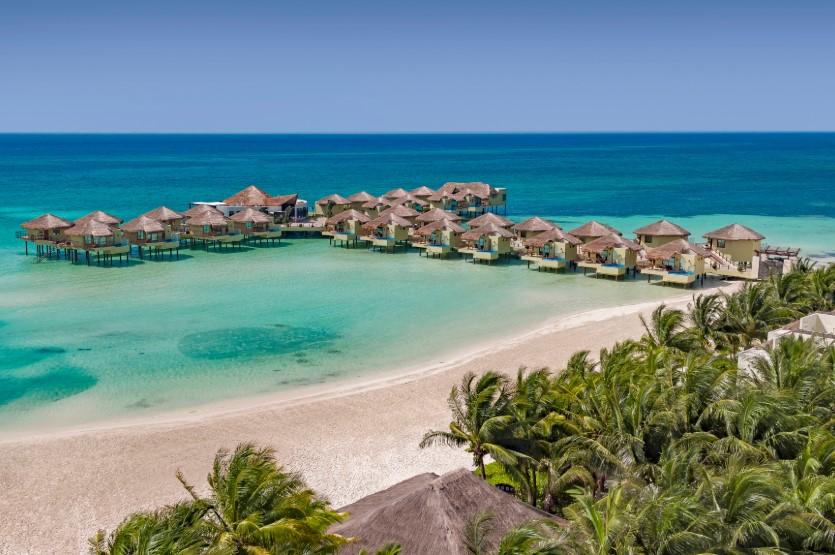 Aerial view of Palafitos Overwater Bungalows at El Dorado Maroma on the Caribbean coast of Riviera Maya, Mexico.