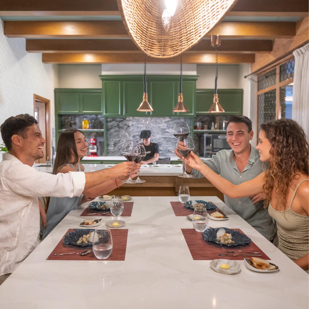 Friends enjoying dinner together at Valentin Imperial Riviera Maya